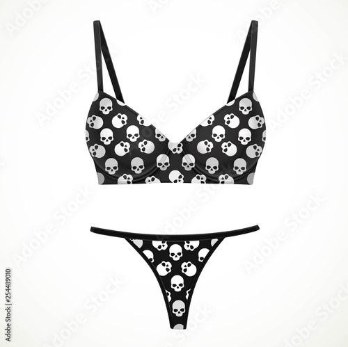 Black bra and bikini panties objects in a pattern of white skulls isolated on white background