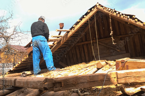 Demolition of an old wooden house