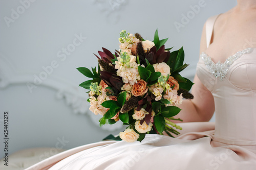 Woman in beautiful dress ho...