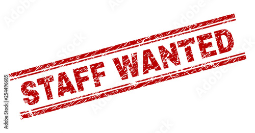 STAFF WANTED seal watermark with corroded texture. Red vector rubber print of STAFF WANTED tag with dust texture. Text tag is placed between double parallel lines.
