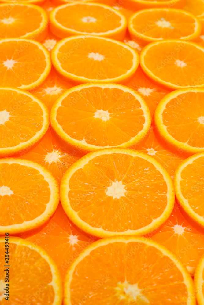 Slices of oranges as a background, top view. Slices of oranges as a background, top view.