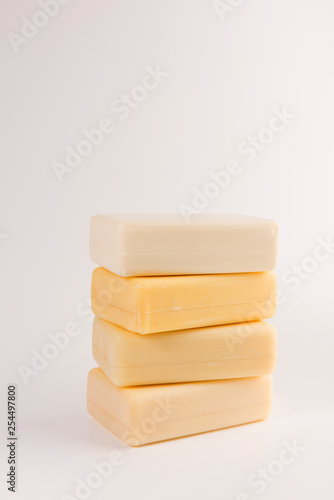 Stack of soap bars isolated on white background