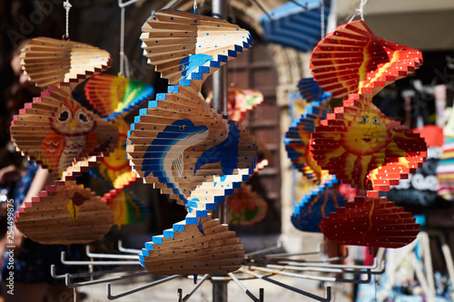 Fototapeta Naklejka Na Ścianę i Meble -  Multi-colored toys on the street of the city of Rhodes, Greece