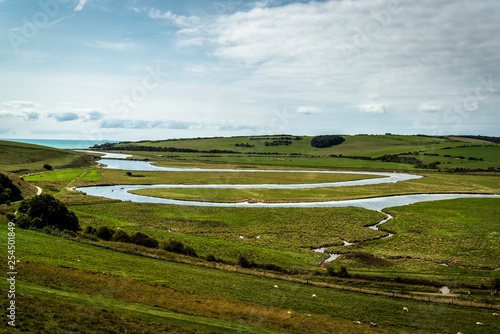Cuckmere Haven, a meandering river forming several oxbow lakes, between Seaford and Eastbourne, East Sussex, England, UK photo