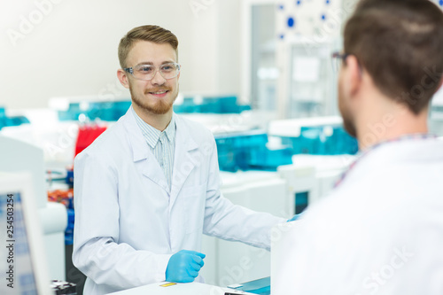 Two male scientists working at the laboratory