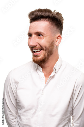 Studio photo of a good-looking man in a white shirt, isolated over a white background