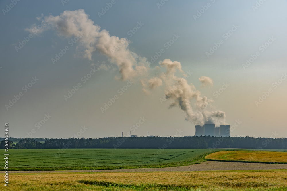 Nuclear powerplant near Temelin village in summer hot cloudy day Nuclear powerplant near Temelin village in summer hot cloudy day