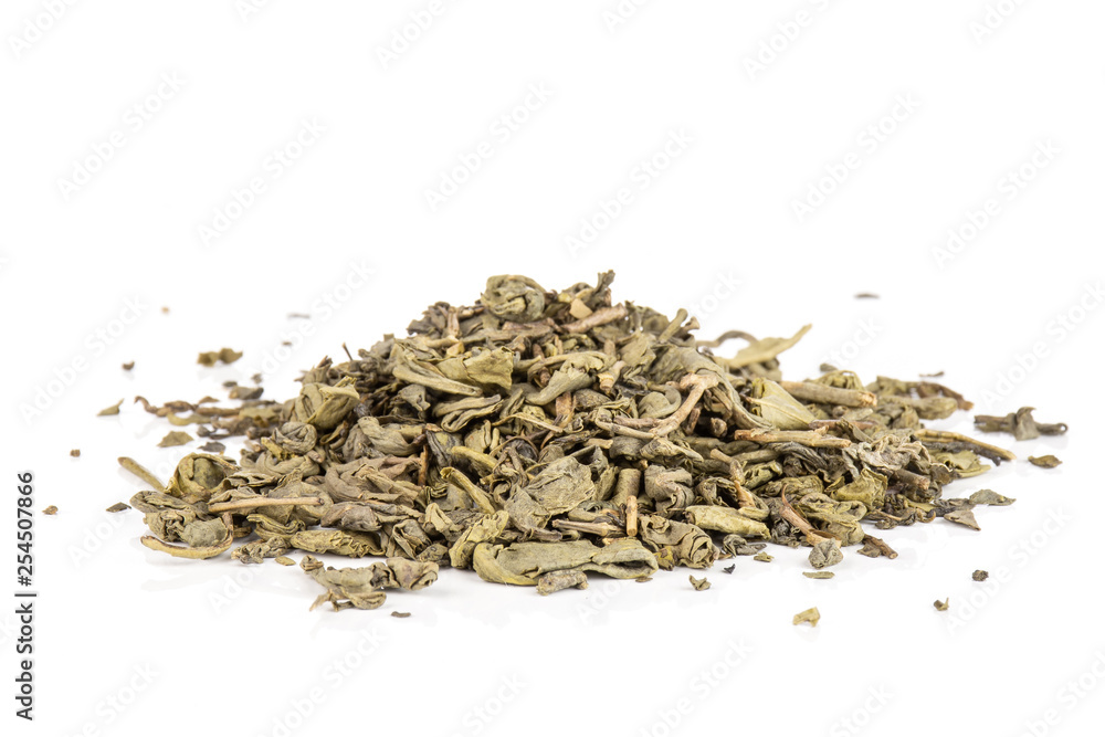 Lot of pieces of dry green tea heap isolated on white background Lot of pieces of dry green tea heap isolated on white background