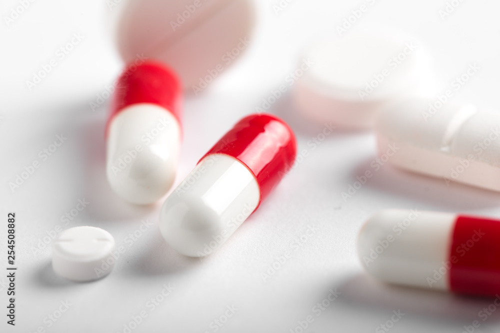 Assorted pharmaceutical medicine pills, tablets and capsules.Pills background.