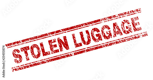 STOLEN LUGGAGE seal print with grunge texture. Red vector rubber print of STOLEN LUGGAGE text with dirty texture. Text tag is placed between double parallel lines.