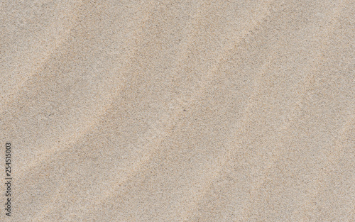 Ripple on the sand. Nature cream background