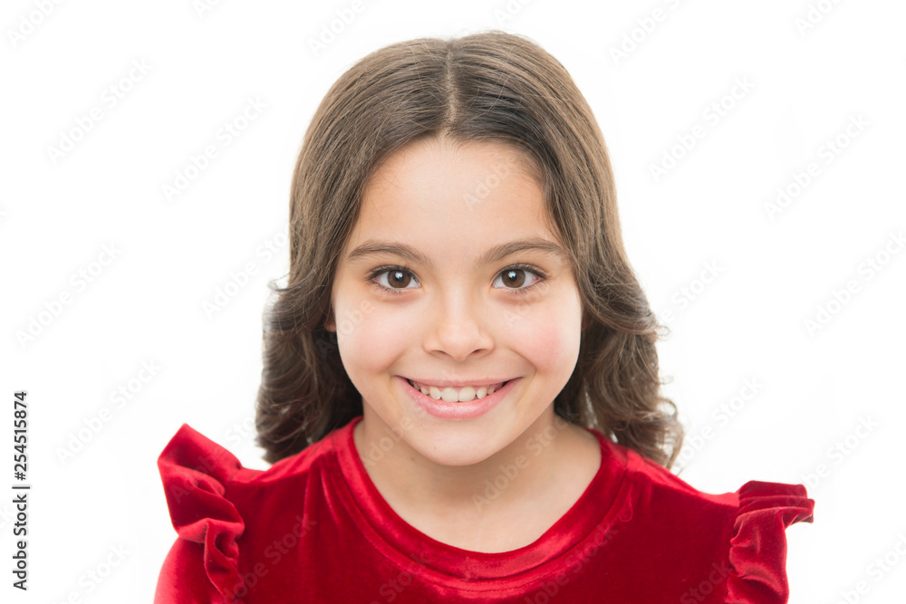 Kid happy cute face with adorable curly hair. Beauty tips for tidy hair. Young skin care. Pure beauty. Kid girl long healthy shiny hair on white background isolated. Little girl with long hair Kid happy cute face with adorable curly hair. Beauty tips for tidy hair. Young skin care. Pure beauty. Kid girl long healthy shiny hair on white background isolated. Little girl with long hair