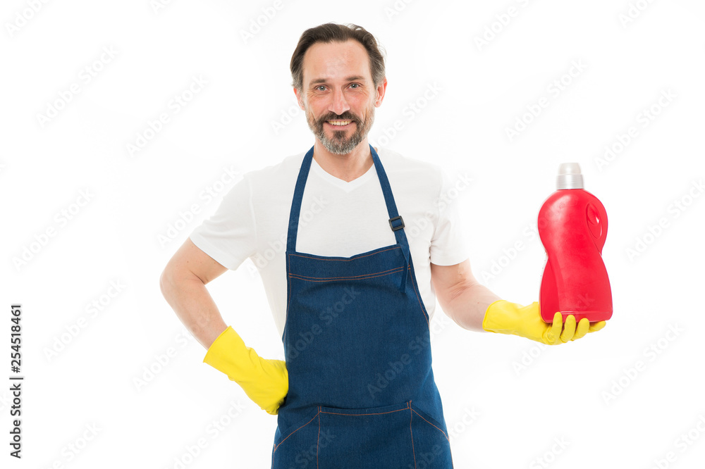 Actually soap is available. Household worker. Senior man holding bottle of laundry detergent or dish soap. Mature man doing household activity. Household laundering. Providing household service Actually soap is available. Household worker. Senior man holding bottle of laundry detergent or dish soap. Mature man doing household activity. Household laundering. Providing household service