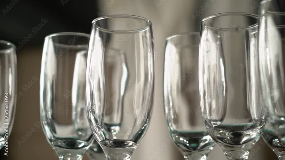 Empty glasses at table ready for party and drinks Empty glasses at table ready for party and drinks