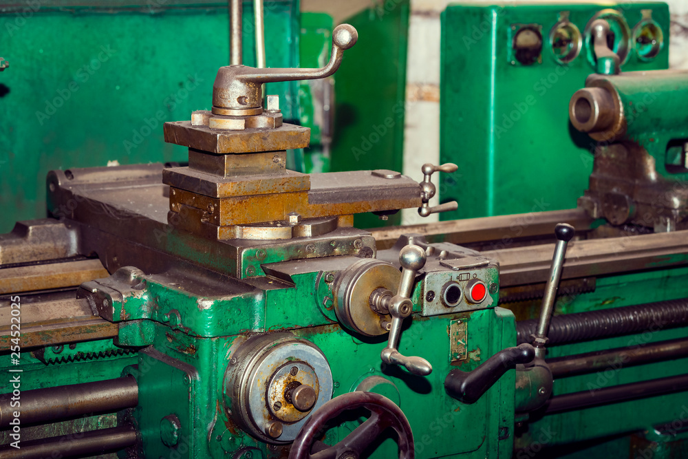 Metalworking machines working mechanisms are shot close-up Metalworking machines working mechanisms are shot close-up