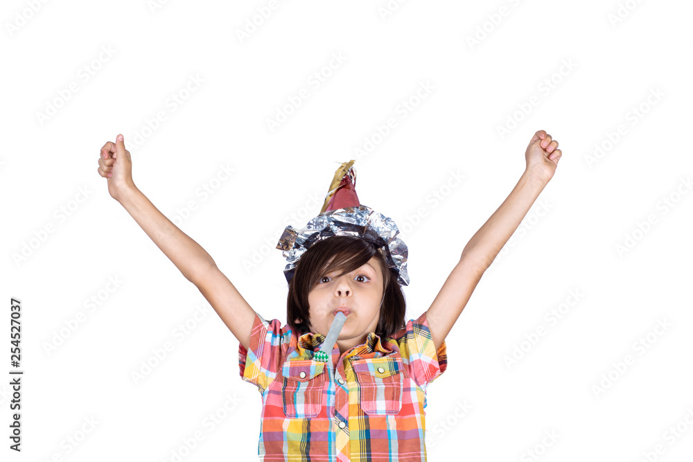 Little boy with whistle and party hat. Little boy with whistle and party hat.