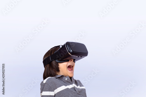 Little boy playing video games with VR. © Mego-studio