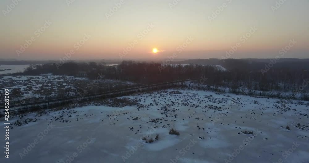 Frozen Balaton lake, aerial shot, winter season, sunrise Frozen Balaton lake, aerial shot, winter season, sunrise