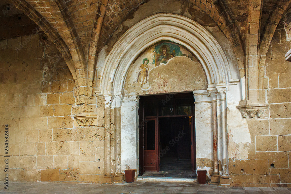 Entance of the church of Abbey of Bellapais in the Northern Cyprus. Bellapais Abbey is the ruin of a monastery built by Canons Regular in the 13th century near the Kyrenia (Girne).