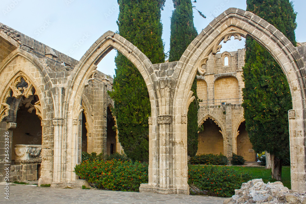 Ruins of the Abbey of Bellapais in the Northern Cyprus. Bellapais Abbey is the ruin of a monastery built by Canons Regular in the 13th century near the Kyrenia.
