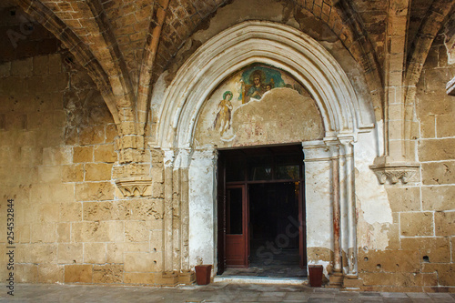 Entance of the church of Abbey of Bellapais in the Northern Cyprus. Bellapais Abbey is the ruin of a monastery built by Canons Regular in the 13th century near the Kyrenia (Girne).
