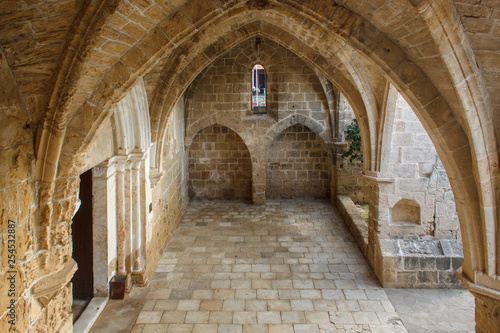 Abbey of Bellapais in the Northern Cyprus. Bellapais Abbey is the ruin of a monastery built by Canons Regular in the 13th century near the Kyrenia (Girne).