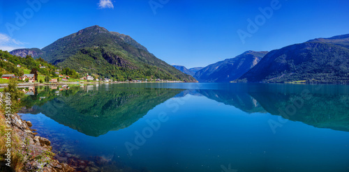 Amazing nature view with fjord and mountains. Beautiful reflection. Norway.