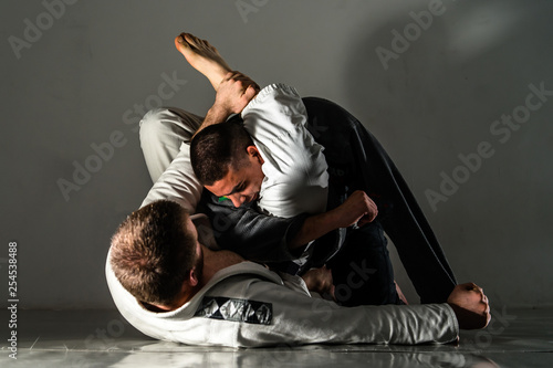 Brazilian Jiu Jitsu BJJ training sparring fight triangle submission photo
