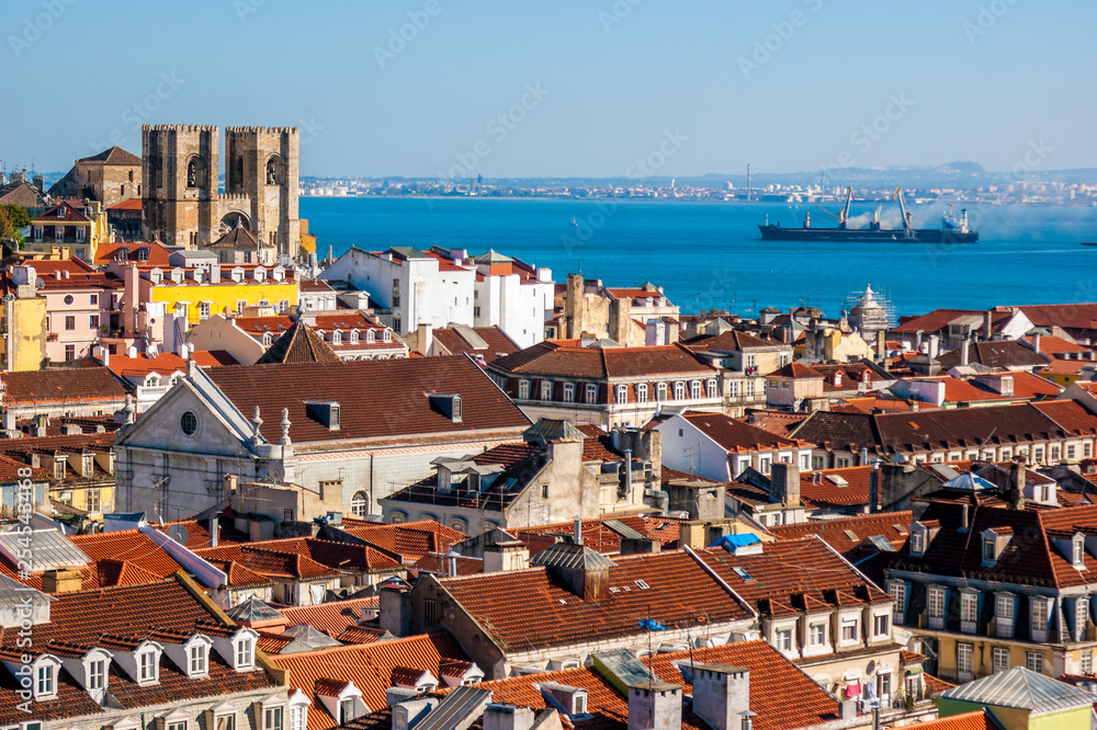 Panoramic view of Lisbon from a viewpoint, with the Cathedral and the Tagus river in Portugal