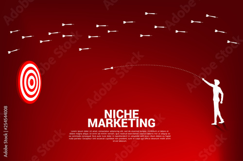 silhouette of businessman throw out dart arrow to hit the dartboard from another way. Business Concept of niche marketing, targeting and customer. Company vision mission.