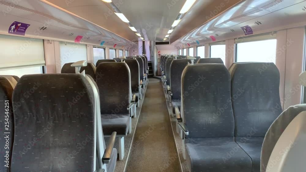 Empty moving modern first class SNCB passenger train wagon in Belgium. Empty moving modern first class SNCB passenger train wagon in Belgium.