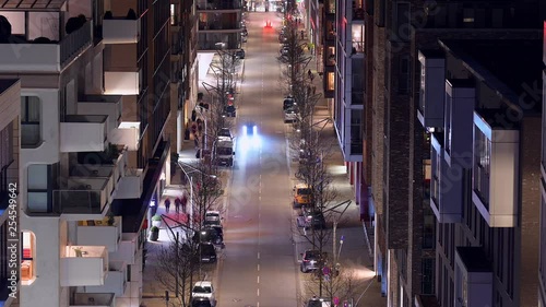 Hamburg time-lapse of a straight road traiffic in a residential district photo