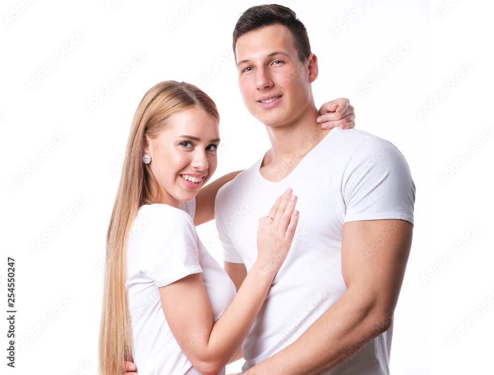 Romantic couple embracing each other on white Romantic couple embracing each other on white