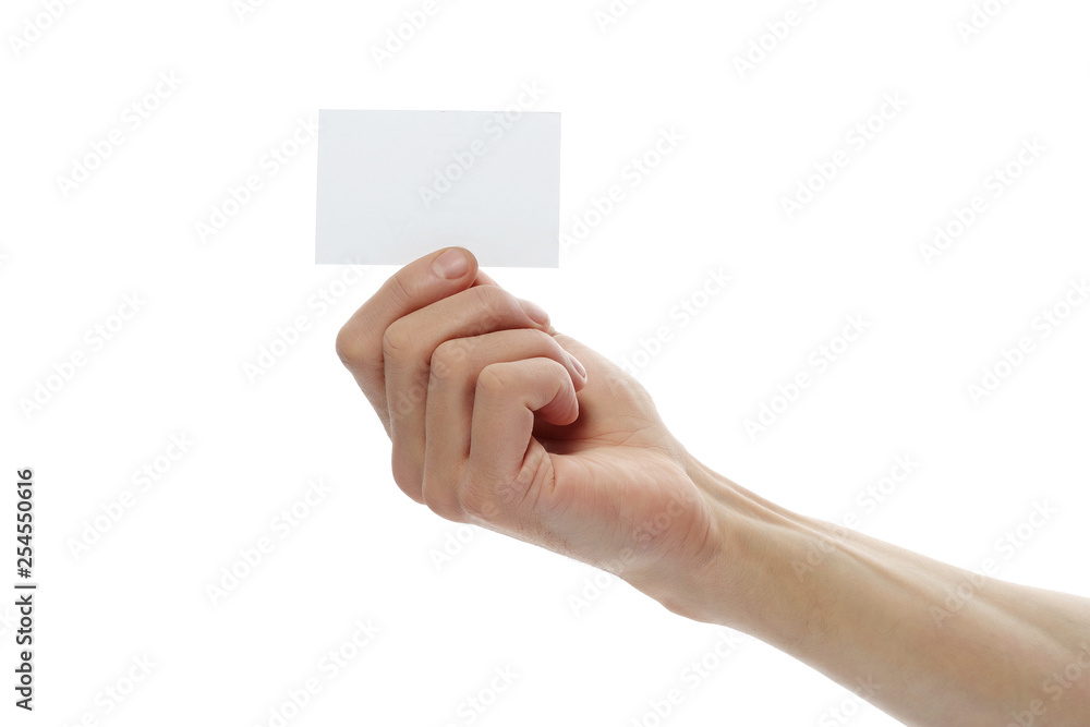 The hand holding the business card is isolated. The hand holding the business card is isolated.