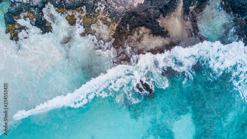 HAWAII, USA: drone shot of turquoise sea beach in Kua Bay, Big Island