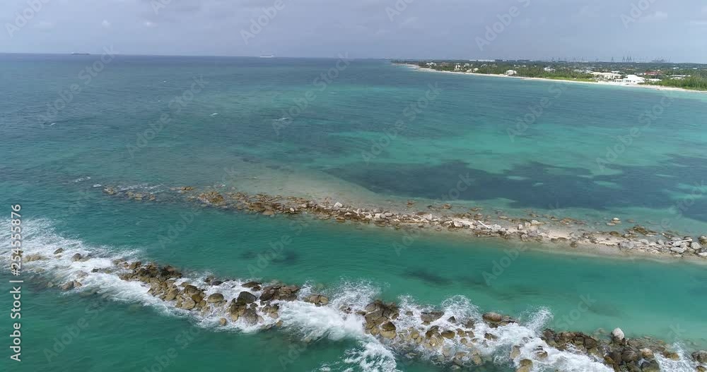 Waves Crashing on Rocks - 4K Aerial Video taken from 200 Feet. Waves Crashing on Rocks - 4K Aerial Video taken from 200 Feet.