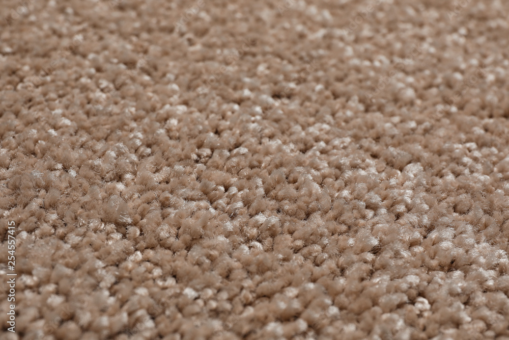Fuzzy carpet texture as background, closeup view Fuzzy carpet texture as background, closeup view