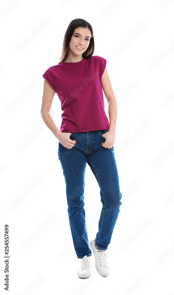 Obraz premium Beautiful young woman in stylish clothes on white background