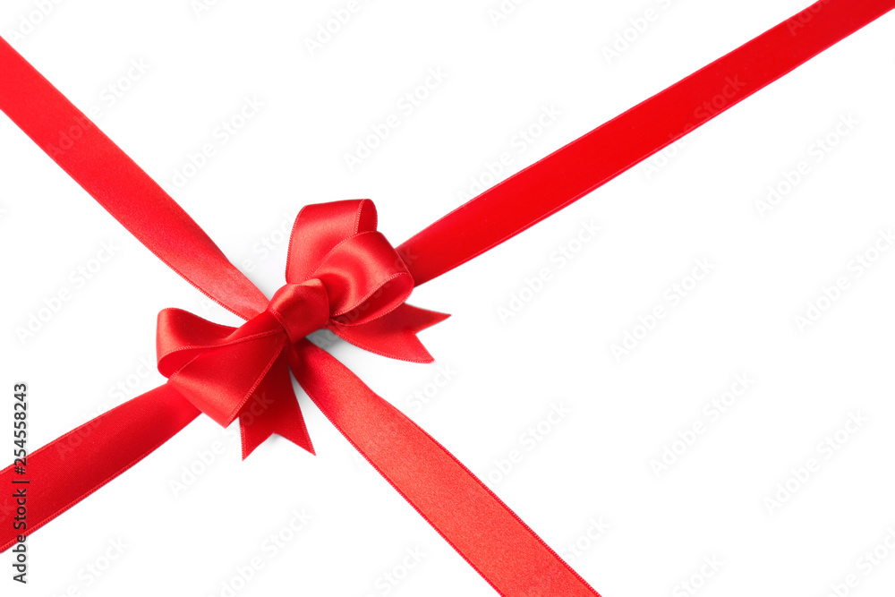 Red ribbon with bow on white background. Festive decoration Red ribbon with bow on white background. Festive decoration