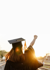 University graduate celebrate after receiving degree. Graduate celebration