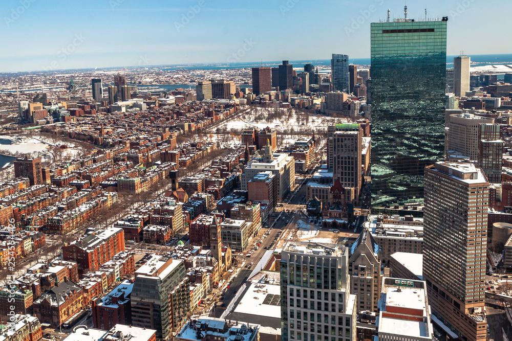 Obraz premium Boston, USA- March 08, 2019: panorama, a view from the air on the snowy Boston streets, Massachusetts, United States.