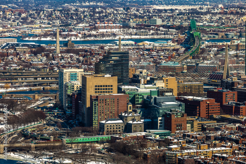 Obraz premium Boston, USA- March 08, 2019: panorama, a view from the air on the snowy Boston streets, Massachusetts, United States.