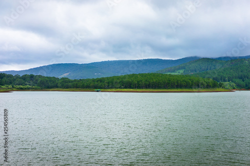 Amazing, beautiful panorama of Tuyen Lam lake of Dalat city, fresh air, group of villa among forest, impression shape of hill and mountain, lake alternate jungle make wonderful countryside for travel