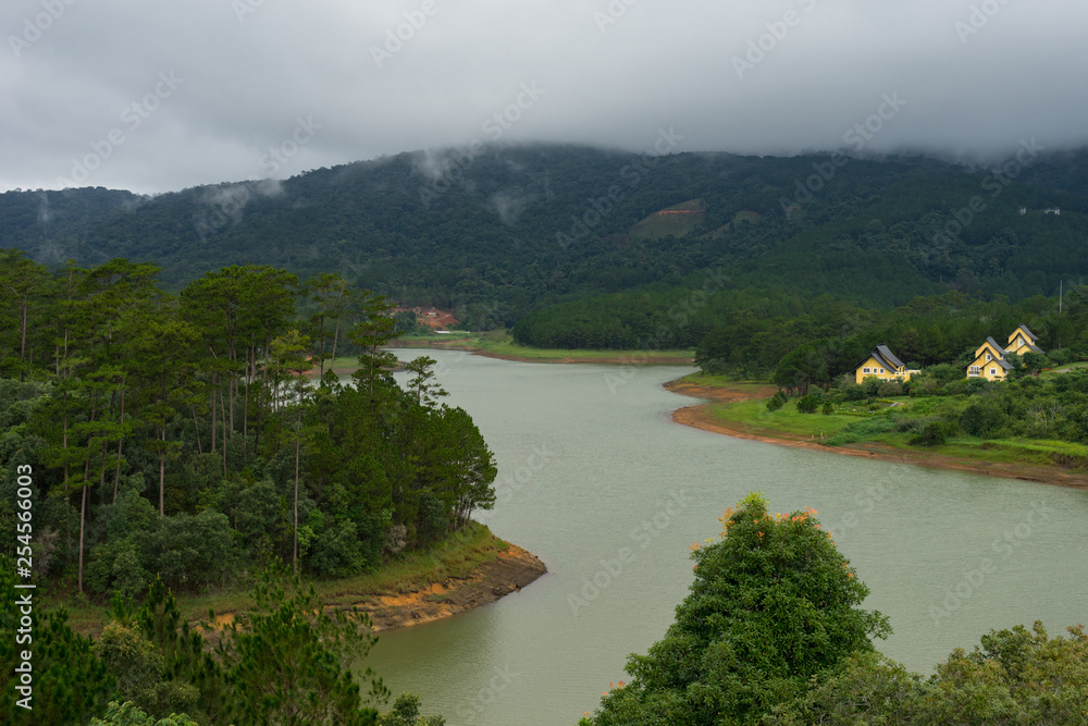 Amazing, beautiful panorama of Tuyen Lam lake of Dalat city, fresh air, group of villa among forest, impression shape of hill and mountain, lake alternate jungle make wonderful countryside for travel