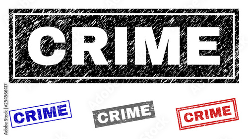 Grunge CRIME rectangle stamp seals isolated on a white background. Rectangular seals with grunge texture in red, blue, black and grey colors.