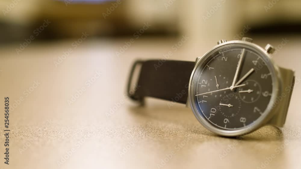 Wrist watch on a table with a blurry background Wrist watch on a table with a blurry background