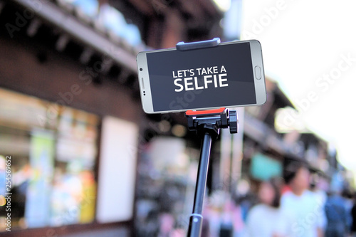 close up of empty smartphone screen with selfie stick