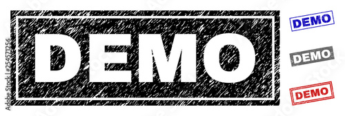 Grunge DEMO rectangle stamp seals isolated on a white background. Rectangular seals with distress texture in red, blue, black and grey colors.