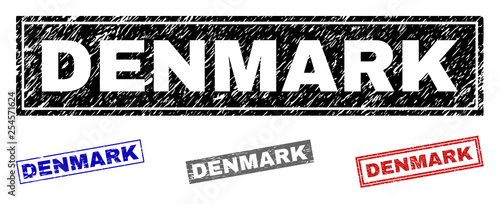 Grunge DENMARK rectangle stamp seals isolated on a white background. Rectangular seals with distress texture in red, blue, black and grey colors.