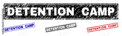 Grunge DETENTION CAMP rectangle stamp seals isolated on a white background. Rectangular seals with distress texture in red, blue, black and grey colors.